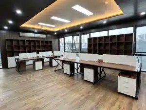 Các yếu tố ảnh hưởng đến giá thi công tủ văn phòng